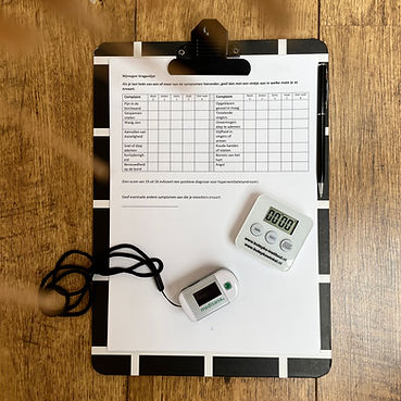 clipboard with paper and timer